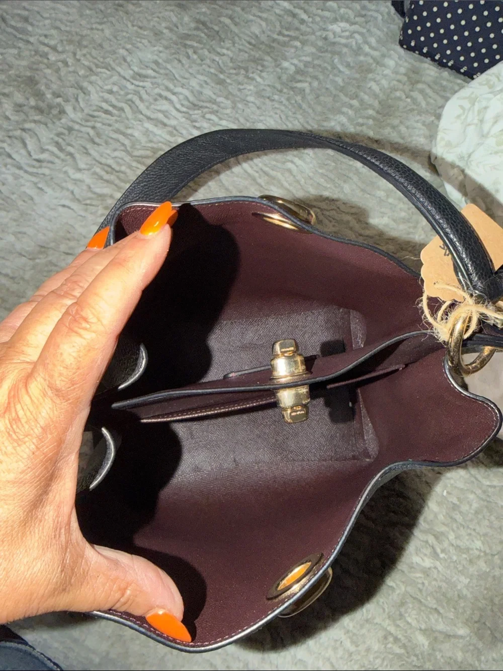 Coach bucket bag, likely the Charlie or Town model